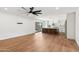 Open-concept kitchen and living space showcasing modern design and light wood flooring at 20 W Pasadena Ave, Phoenix, AZ 85013