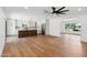 Open concept kitchen and living area with seamless flooring and ample space for gatherings at 20 W Pasadena Ave, Phoenix, AZ 85013