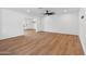 Bright and spacious living room with sleek flooring and open space, perfect for entertaining at 20 W Pasadena Ave, Phoenix, AZ 85013