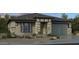 Charming single-story home featuring stone accents, neutral colors, and a two-car garage at 20712 E Via Del Oro --, Queen Creek, AZ 85142