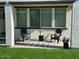 Relaxing covered patio area featuring stylish seating, an outdoor rug, and serene decor, perfect for quiet moments at 22876 E Via Del Sol --, Queen Creek, AZ 85142
