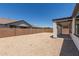 Low maintenance gravel backyard with block wall offers privacy and simplicity at 22876 E Via Del Sol --, Queen Creek, AZ 85142
