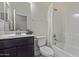 Bathroom featuring a dark vanity, white toilet, and a bathtub with a shower featuring a white curtain at 22876 E Via Del Sol --, Queen Creek, AZ 85142