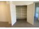 Walk-in closet with shelving and double doors at 22876 E Via Del Sol --, Queen Creek, AZ 85142