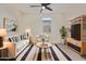 Cozy living room featuring stylish furniture, natural light, and contemporary decor at 22876 E Via Del Sol --, Queen Creek, AZ 85142