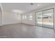 Bright living room with tile flooring, recessed lighting, and access to the patio at 22876 E Via Del Sol --, Queen Creek, AZ 85142