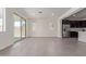 Spacious living room with tile flooring and a sliding door to the outside at 22876 E Via Del Sol --, Queen Creek, AZ 85142