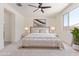 Light and airy primary bedroom featuring neutral tones and a large window at 22876 E Via Del Sol --, Queen Creek, AZ 85142