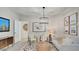 Cozy living room with modern lighting and neutral décor at 24063 W Cocopah St, Buckeye, AZ 85326
