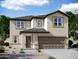 Beautiful two-story home with a neutral color palette, a two-car garage and desert landscaping at 24245 W Hidalgo Ave, Buckeye, AZ 85326