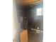 View inside a shed, showing storage and some natural light at 25 W Illini St, Phoenix, AZ 85041