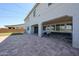 Expansive backyard featuring a covered patio, offering ample space for outdoor activities and relaxation at 25051 N 140Th Dr, Surprise, AZ 85387