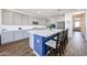 Stylish kitchen featuring a spacious island, ample counter space, and modern appliances at 25051 N 140Th Dr, Surprise, AZ 85387
