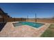 Inviting pool area surrounded by low-maintenance landscaping, a perfect space for summer fun and relaxation at 25051 N 140Th Dr, Surprise, AZ 85387