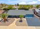 Aerial shot of home with drought-resistant desert landscaping, blue accents, and an inviting walkway at 2708 E Villa Theresa Dr, Phoenix, AZ 85032