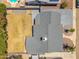 An aerial view of the property shows the roof, yard, and surrounding landscape from above at 2708 E Villa Theresa Dr, Phoenix, AZ 85032