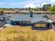 This aerial view reveals a large backyard and covered patio on a charming home in a well-kept neighborhood at 2708 E Villa Theresa Dr, Phoenix, AZ 85032
