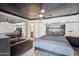 Relaxing bedroom with mirrored closet, ceiling fan, and modern furnishings at 2708 E Villa Theresa Dr, Phoenix, AZ 85032