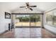 Well-lit sunroom with patio view, offering a tranquil indoor-outdoor experience at 2708 E Villa Theresa Dr, Phoenix, AZ 85032