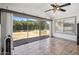 Bright sunroom with terra cotta tiles and a scenic view of the backyard at 2708 E Villa Theresa Dr, Phoenix, AZ 85032