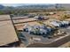 Beautiful aerial view of luxury estate in a neighborhood with mountain backdrop at 3518 N 201St Ln, Buckeye, AZ 85396