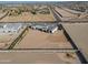 Wide aerial of luxury estate highlighting vast lot, privacy wall, and desert views at 3518 N 201St Ln, Buckeye, AZ 85396