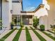 Stylish courtyard with lush landscaping and seamless indoor-outdoor living at 3518 N 201St Ln, Buckeye, AZ 85396
