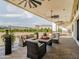 Inviting outdoor patio with comfortable seating and scenic views for relaxing and entertaining at 3518 N 201St Ln, Buckeye, AZ 85396