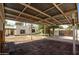 Large carport with covered ceiling overlooks the expansive backyard and outdoor space at 356 W Roma Ave, Phoenix, AZ 85013