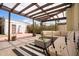 Beautiful pergola area with ample seating, perfect for entertaining or relaxing outdoors in a serene setting at 356 W Roma Ave, Phoenix, AZ 85013