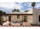 Inviting pergola area with comfortable seating, a stylish rug, and ambient lighting, perfect for outdoor relaxation at 356 W Roma Ave, Phoenix, AZ 85013