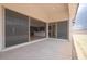 Covered back patio providing seamless indoor-outdoor flow for relaxation and entertaining with view of interior at 3824 W Lodge Dr, Laveen, AZ 85339