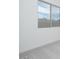 Bedroom with neutral carpet, a large window with a view, and white walls at 3824 W Lodge Dr, Laveen, AZ 85339