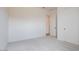 Bedroom with plush carpeting, neutral walls, and a closet with a sliding door at 3824 W Lodge Dr, Laveen, AZ 85339