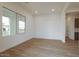 Bright living room with tile floors, large windows, and a minimalist design at 3824 W Lodge Dr, Laveen, AZ 85339