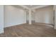 Expansive living room featuring tile floors, recessed lights, and an open-concept design with support columns at 3824 W Lodge Dr, Laveen, AZ 85339