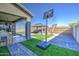 Backyard with turf, a patio and gazebo, perfect for relaxation and recreation at 4507 S 119Th Dr, Avondale, AZ 85323