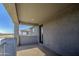 Serene outdoor balcony with views of the neighborhood provides a tranquil setting for unwinding and enjoying the scenery at 4507 S 119Th Dr, Avondale, AZ 85323