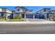 Charming two-story home with a three car garage, manicured lawn, and desert landscaping at 4507 S 119Th Dr, Avondale, AZ 85323