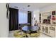 Entertaining game room with pool table, game table, and custom cabinets at 4507 S 119Th Dr, Avondale, AZ 85323
