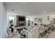 Spacious living room with modern decor, fireplace, and lots of natural light at 4507 S 119Th Dr, Avondale, AZ 85323