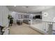 Open-concept living room with sleek design, modern lighting, and comfortable seating at 4507 S 119Th Dr, Avondale, AZ 85323