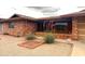 Beautiful brick home showcasing drought tolerant landscaping and a welcoming front yard at 4537 E Emelita Ave, Mesa, AZ 85206