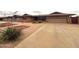 Lovely home with desert landscaping, a tidy front yard, and a concrete driveway at 4537 E Emelita Ave, Mesa, AZ 85206