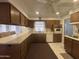 Bright kitchen with generous countertop space and warm wood cabinetry at 4537 E Emelita Ave, Mesa, AZ 85206