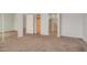 The bedroom view showcases mirrored closet doors with an attached bathroom at 4891 E Meadow Mist Ln, San Tan Valley, AZ 85140
