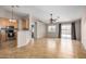 Bright, open-concept kitchen and living area with stainless steel appliances at 4891 E Meadow Mist Ln, San Tan Valley, AZ 85140
