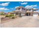 Beautiful two-story home featuring a wide driveway and manicured front yard at 4960 E Colonial Dr, Chandler, AZ 85249