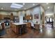 Bright kitchen with an island, stainless steel appliances, and hardwood floors at 5672 E Beverly Ln, Scottsdale, AZ 85254