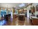 Well-lit kitchen with a skylight, stainless steel appliances, and a central island at 5672 E Beverly Ln, Scottsdale, AZ 85254